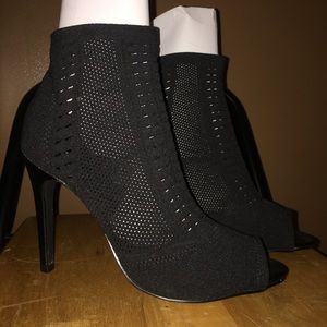 High heel ankle bootie, mesh sock style. Fits snug around entire foot.